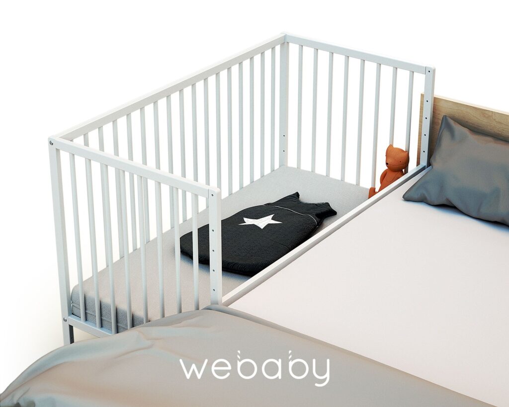 le lit bébé cododo LIO installé à côté du lit des parents permet d'allaiter bébé tout en restant au frais. 